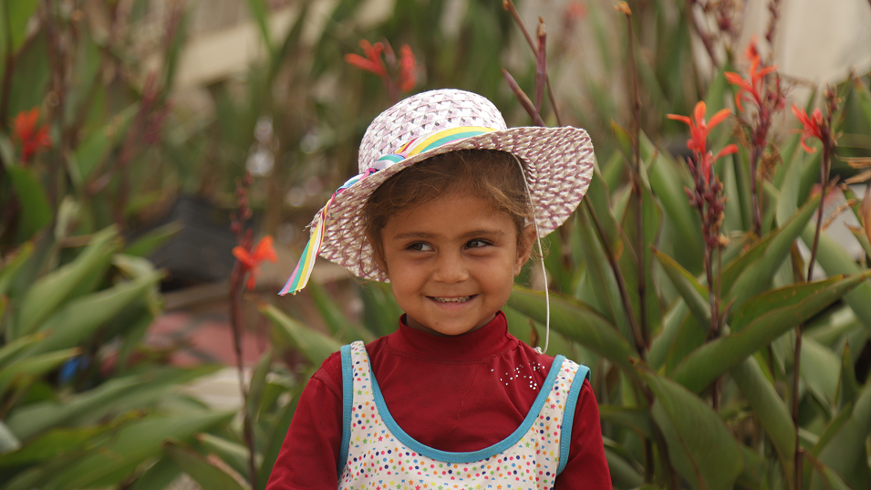 Child holding aid package